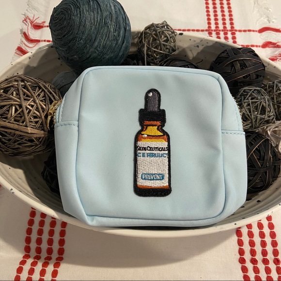 Stoney Clover Lan Handbags - NWOT STONEY CLOVER LANE Sky Mini Pouch Skin